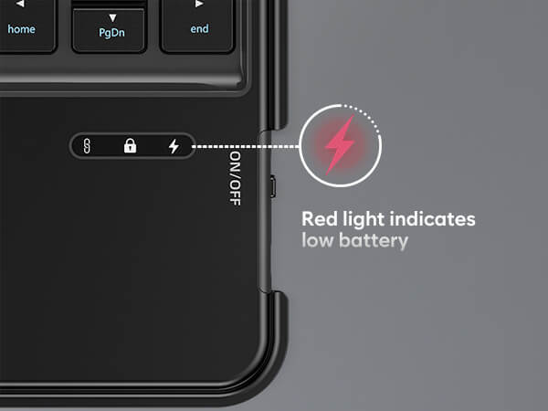 Close-up of a device with a red light indicator for low battery