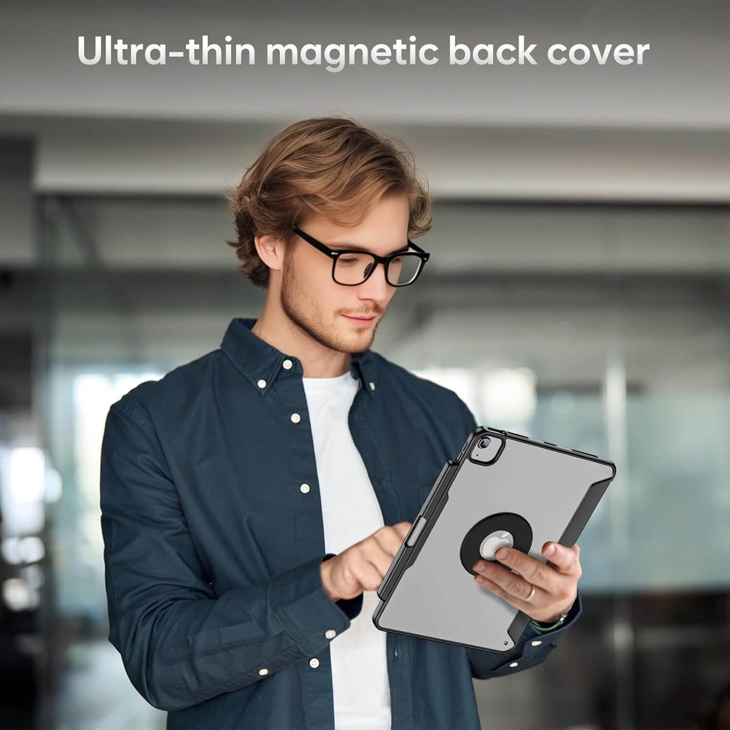 Man holding an iPad with an ultra-thin magnetic back cover in office.