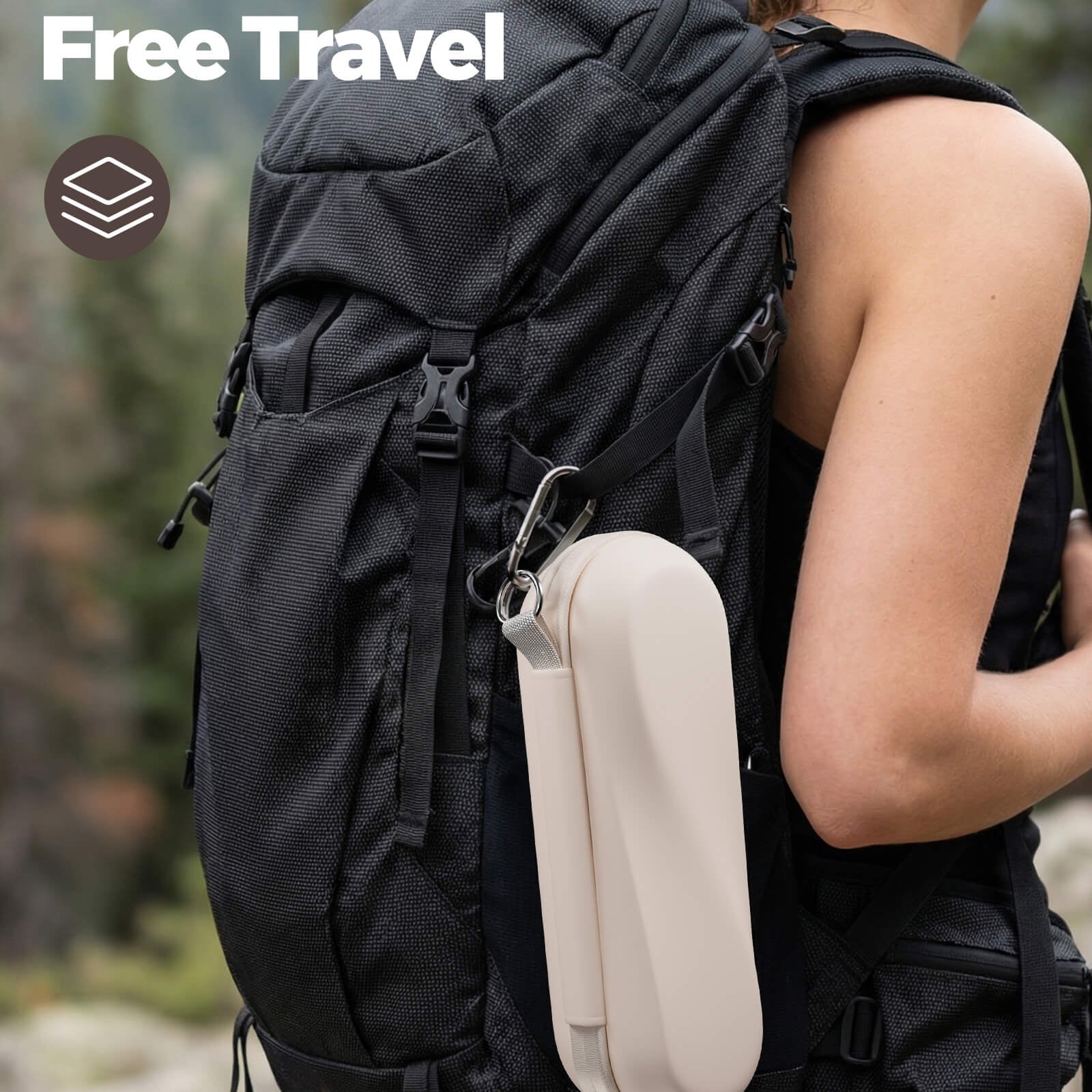 Person wearing a black backpack with a beige side pocket, set against a blurred natural background.
