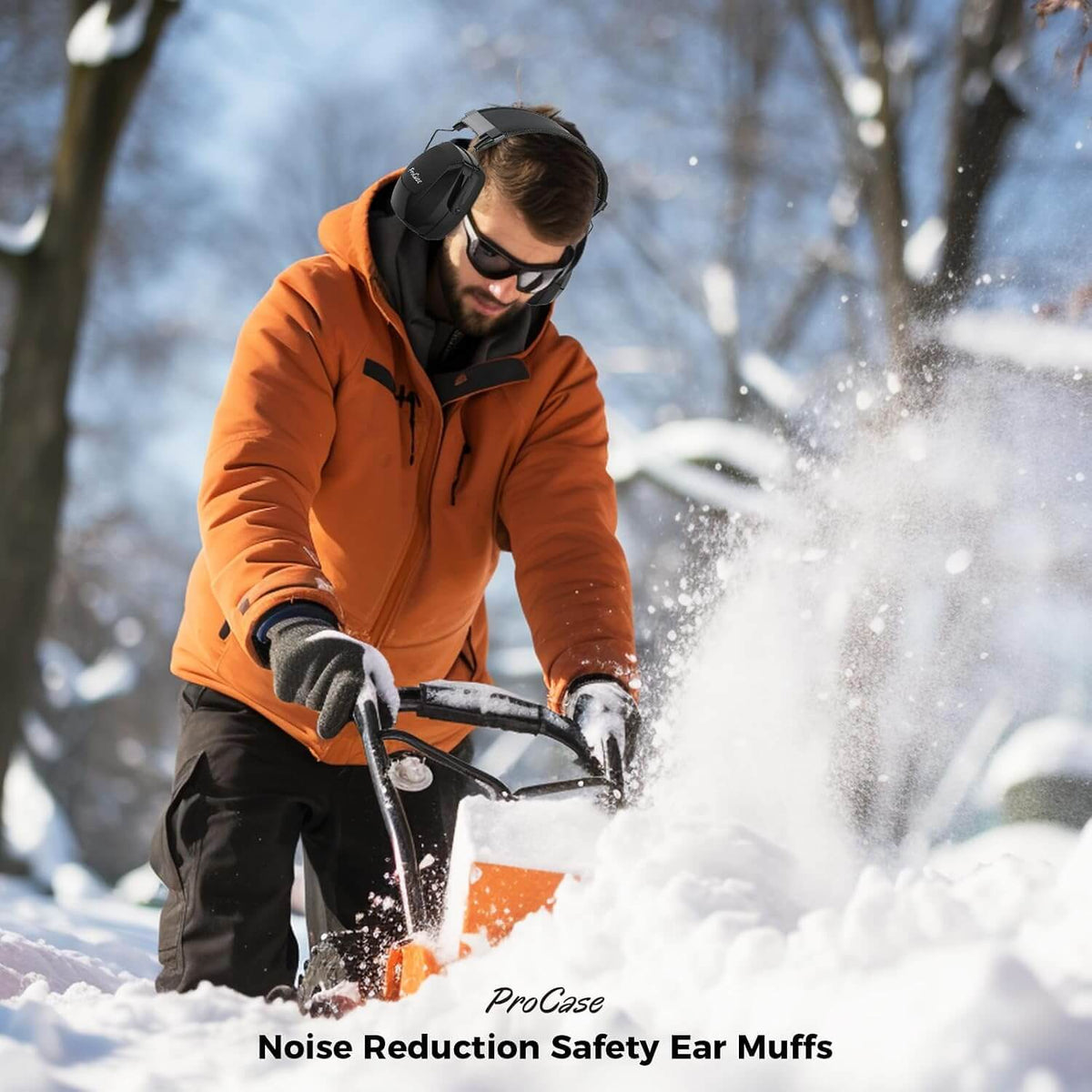 Person using a snow blower in the snow with ProCase noise reduction safety ear muffs.