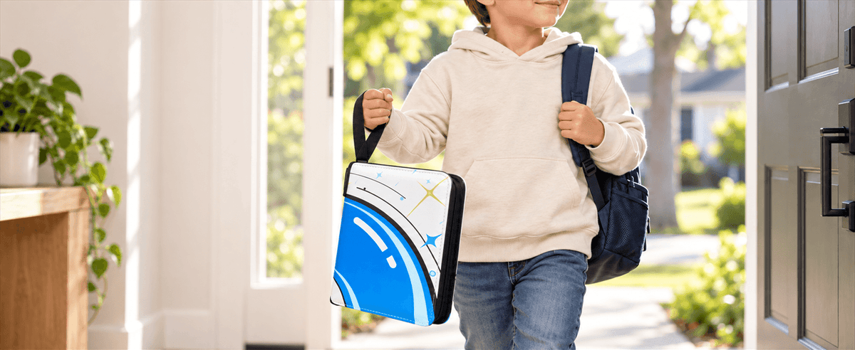 A child wearing a cream hoodie and blue jeans walks through a front door carrying a blue TCG card binder.