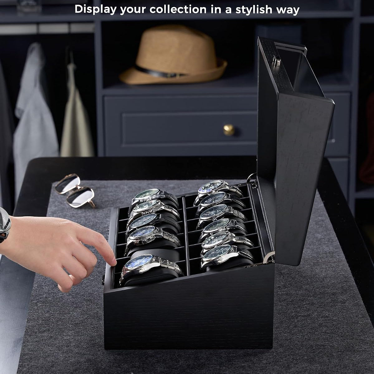 A black wooden watch display box with an open hinged lid, shown holding multiple wristwatches on rotating slots.