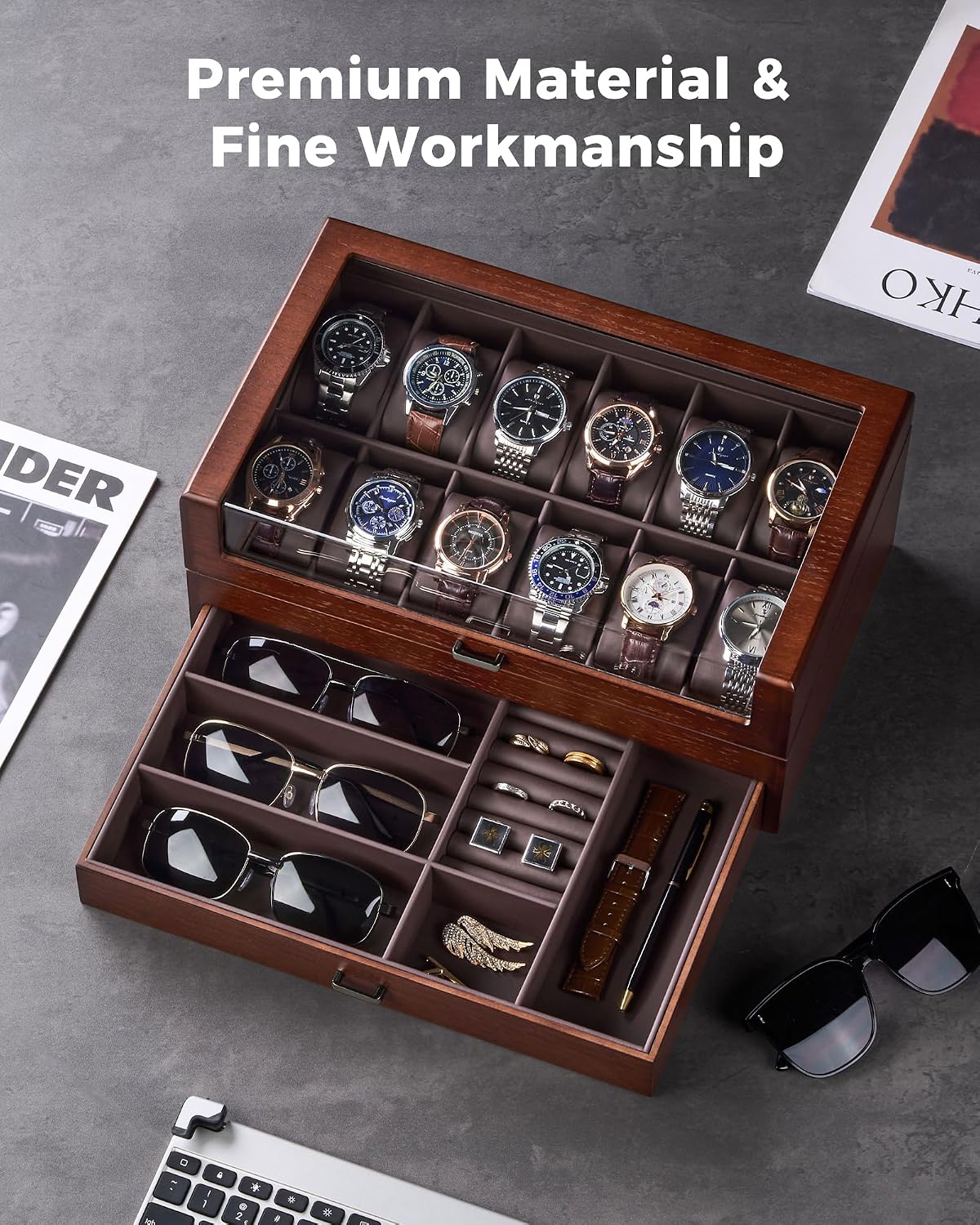 Wooden jewelry box with watches and sunglasses on a gray surface