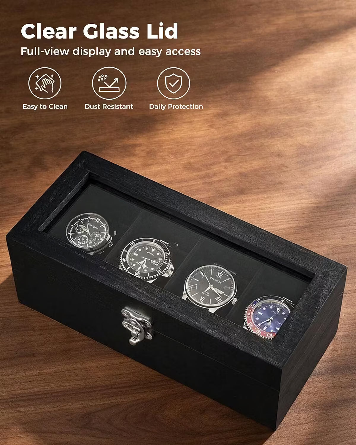 Black wooden watch box with a clear glass lid displaying four watches, set on a wooden surface with feature callouts and icons.