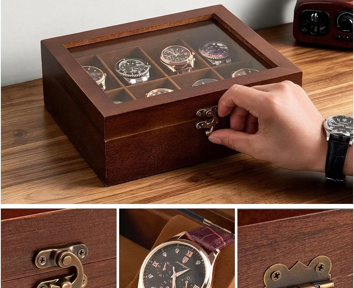 A wooden watch display box with a glass top, shown on a wooden desk with a hand opening its retro swing latch. The top panel reads 'Vintage & Elegant Design' and shows several watches inside.