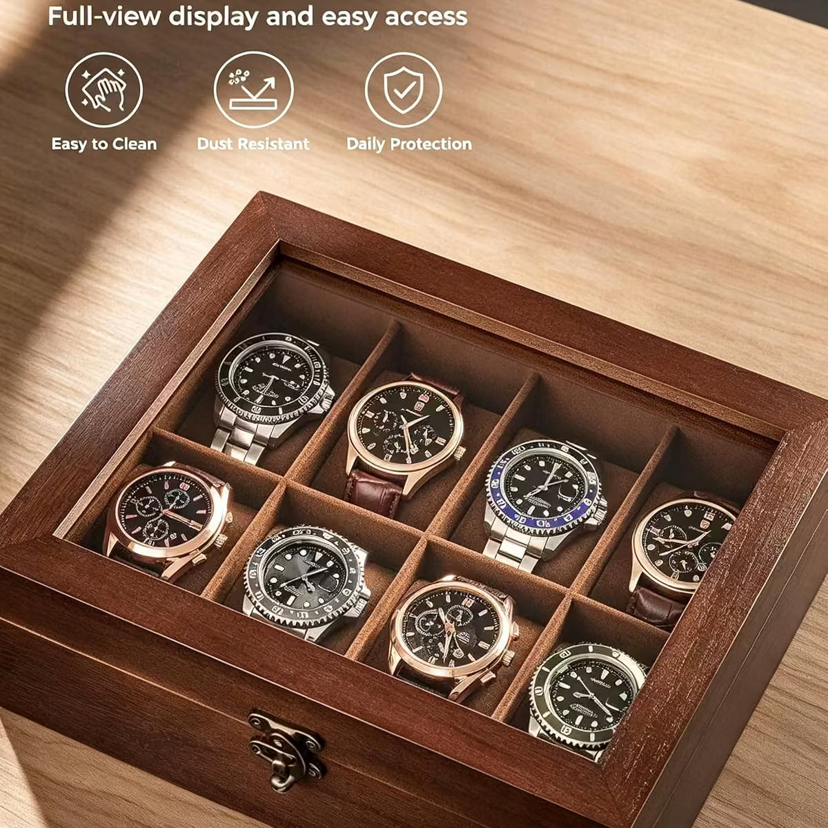 A wooden watch display box with a clear glass lid, shown open on a wood surface. Inside are nine watch slots holding several wristwatches.