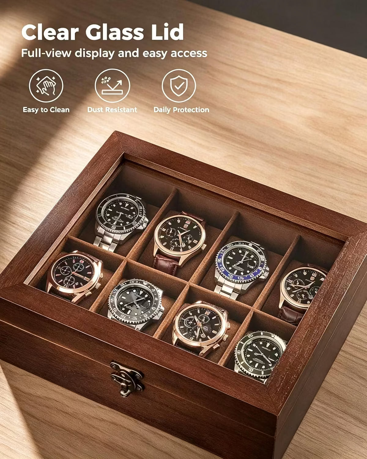 A wooden watch display box with a clear glass lid, shown open on a wood surface. Inside are nine watch slots holding several wristwatches.