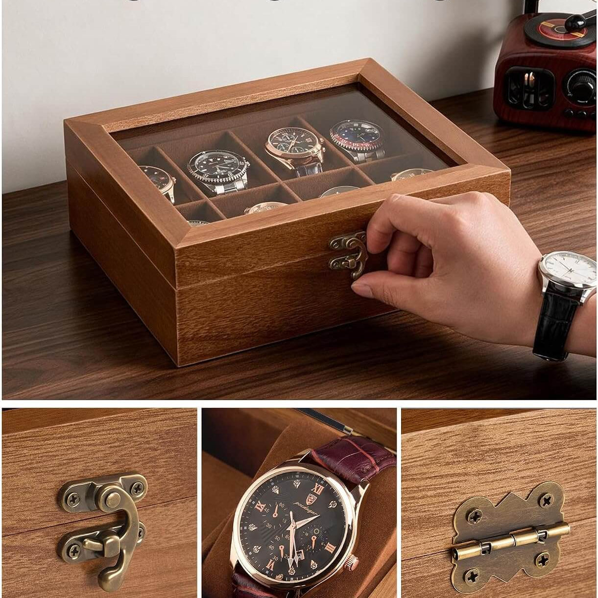 A wooden watch display box with a glass top and vintage-style metal latches, shown on a wooden table with a hand opening the front clasp. The top panel includes the text 'Vintage & Elegant Design' and shows watches stored inside.