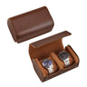 Brown leather watch display case with two watches inside